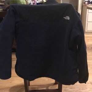 Navy Blue The North Face fleece jacket.